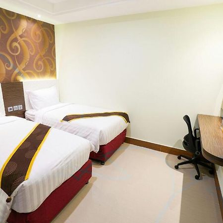 Hotel Grand Citra Makassar Bagian luar foto