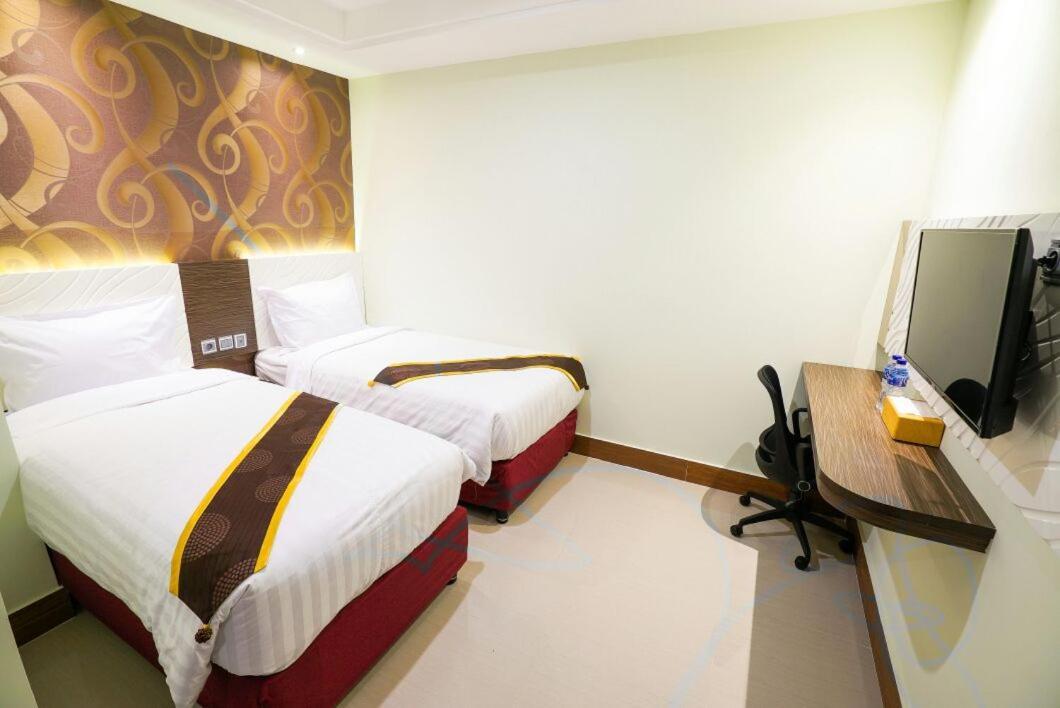 Hotel Grand Citra Makassar Bagian luar foto